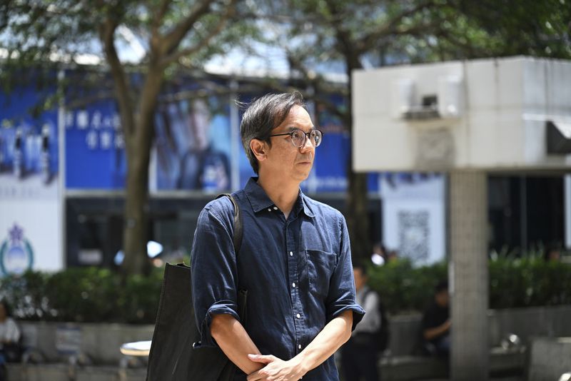 Chung Pui-kuen, the former chief editor of Hong Kong's now shuttered pro-democracy news outlet Stand News, arrivies at the Wanchai District Court ahead of a verdict in a landmark sedition trial in Hong Kong on Thursday, Aug. 29, 2024. (AP Photo/Billy H.C. Kwok)