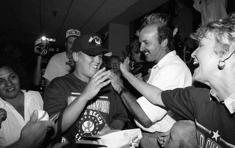 Sean Burroughs, left, pitcher for the Little League World Champion team from Long Beach, Calif., is congratulated as the team arrives at Los Angeles International Airport in this Aug. 29,1993 photo, from Pennsylvania where they scored a 3-2 victory over Panama. (AP Photo/Marj J. Terrill)