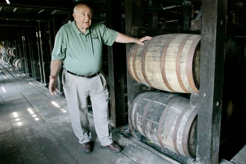 FILE - Wild Turkey master distiller Jimmy Russell talks about bourbon making as he stands in a warehouse in Lawrenceburg, Ky., Wednesday, June 18, 2008. (AP Photo/Ed Reinke, File)