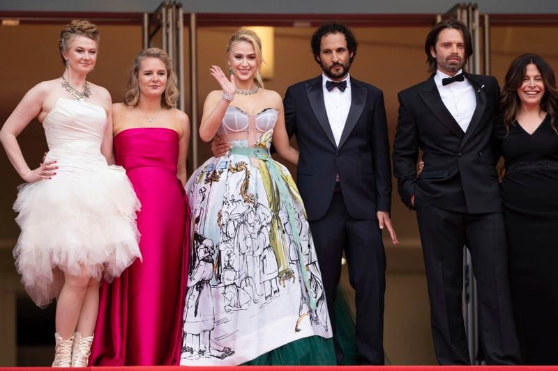 FILE - Julianne Forde, from left, Ruth Treacy, Maria Bakalova, director Ali Abbasi, Sebastian Stan, and Amy Baer pose for photographers upon arrival at the premiere of the film 'The Apprentice' at the 77th international film festival, Cannes, southern France, on May 20, 2024. (Photo by Scott A Garfitt/Invision/AP, File)