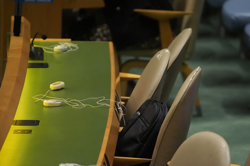 Chairs for the Iranian delegation sit empty as Prime Minister of Israel Benjamin Netanyahu addresses the 79th session of the United Nations General Assembly, Friday, Sept. 27, 2024. (AP Photo/Pamela Smith)