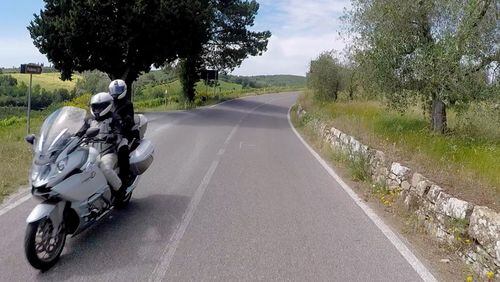 Charles Fleming passes another motorcyclist on SR 222 during a tour of Italy. (Charles Fleming/Los Angeles Times/TNS)