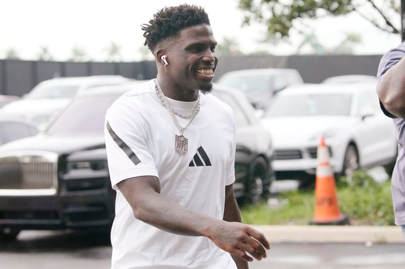 Miami Dolphins wide receiver Tyreek Hill arrives for an NFL football game against the Buffalo Bills, Thursday, Sept. 12, 2024, in Miami Gardens, Fla. (AP Photo/Lynne Sladky)