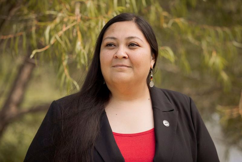 RaeLynn Butler, a Muscogee Nation citizen and one of its tribal historic preservation officers, poses for a photo, Aug. 21, 2024, in Okmulgee, Okla. (AP Photo/Brittany Bendabout)