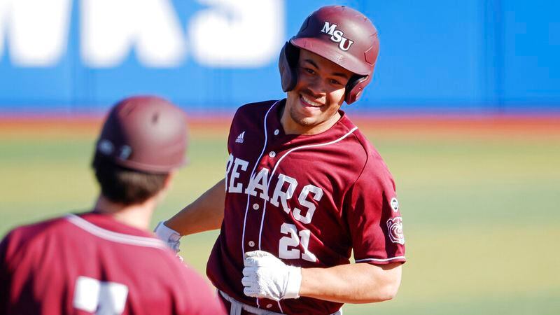 Missouri State's Drake Baldwin hits a home run during an NCAA college baseball game Wednesday, March 2, 2022, in Lawrence, Kansas. (AP Photo/Colin E. Braley)