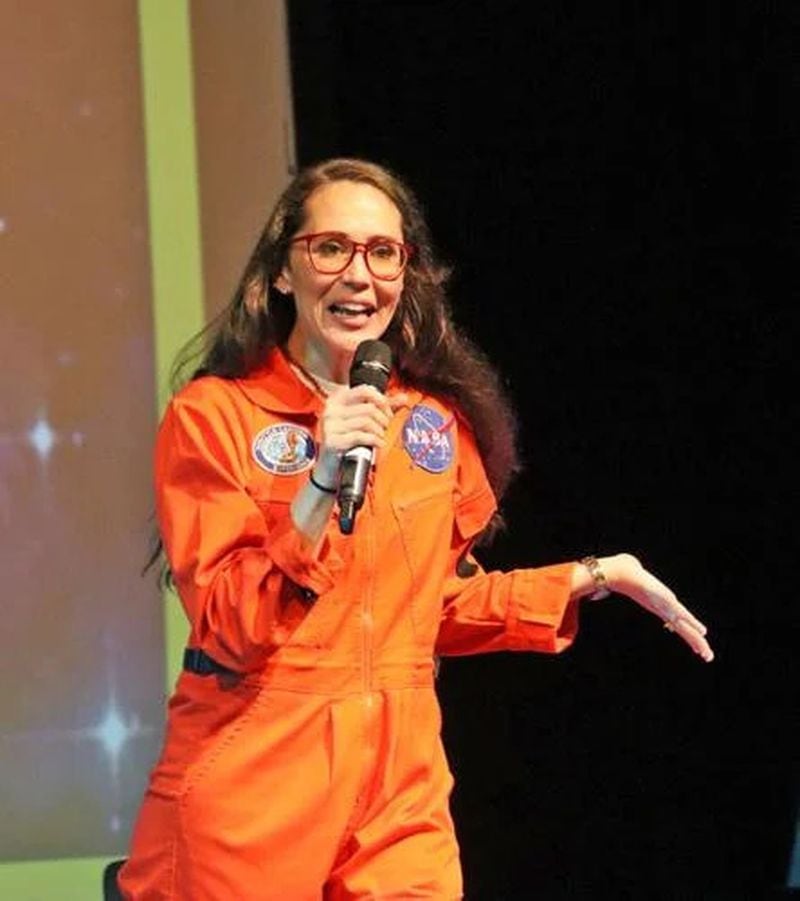 Author Raquel Horn brought her book "Dusko Goes to Space” to life, immersing the audience in a world of literature and music. (Courtesy of Clayton News-Daily)