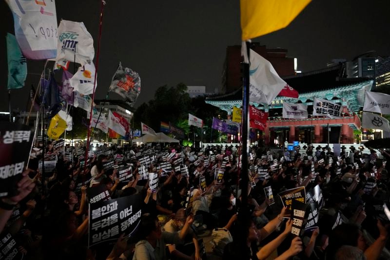 Feminist activists stage a rally against illegal deepfake content calling for the government to enact appropriate countermeasures in Seoul, South Korea, Friday, Sept. 6, 2024. The banners read "Regulate internet platforms that encourage deepfake sexual crimes." (AP Photo/Ahn Young-joon)