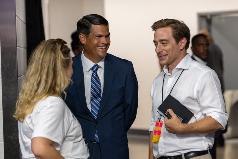 Former Lt. Gov. Geoff Duncan, center, one of the well-known "Never Trumper" Republicans could play a big role in the coming week at the Democratic National Convention in Chicago. (Arvin Temkar / AJC)