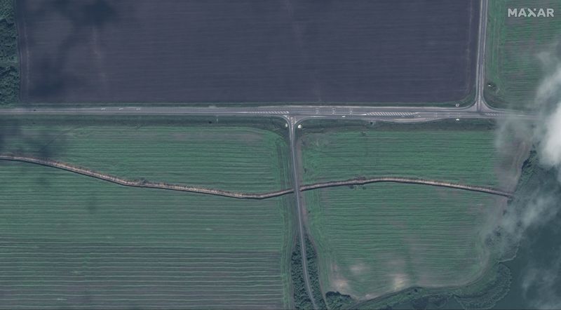 This image released by Maxar Technologies shows defensive trenches that have been built near Lgov and parallel to the E38 highway, west of Kursk, Russia, Monday Aug. 12, 2024. (Satellite image ©2024 Maxar Technologies via AP)