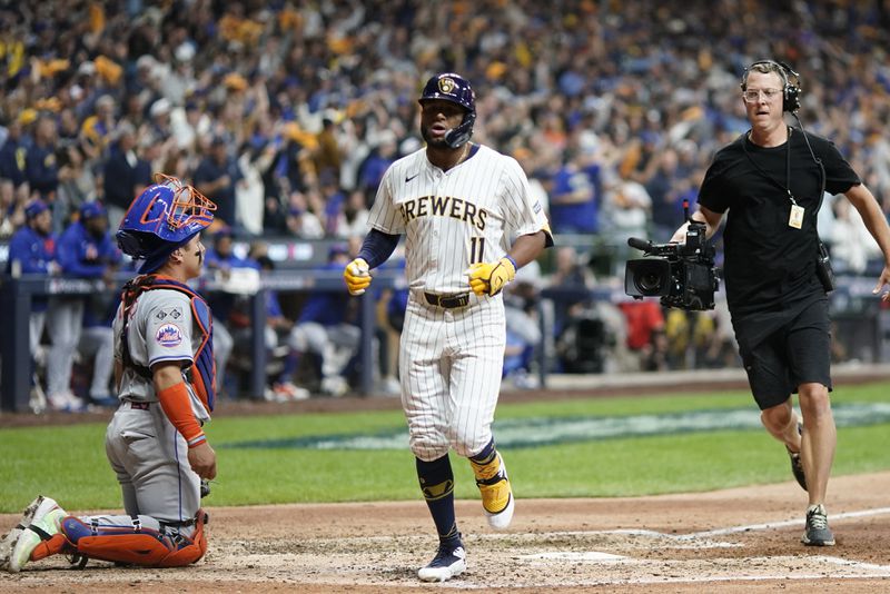 Milwaukee Brewers' Jackson Chourio hits a home run during the eighth inning of Game 2 of a National League wild card baseball game against the New York Mets Wednesday, Oct. 2, 2024, in Milwaukee. (AP Photo/Morry Gash)