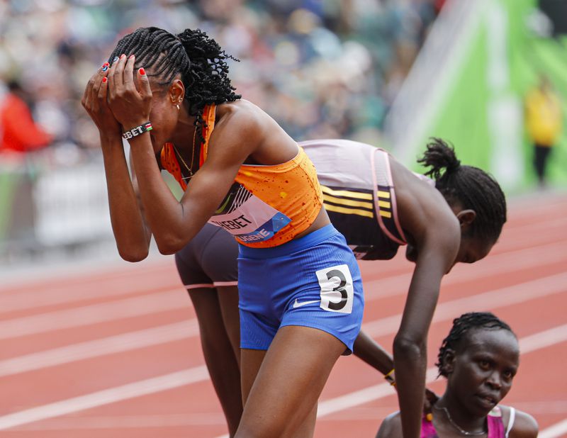 Beatrice Chebet of Kenya, sets a world record in the 10,000 with a time of 28:54.14, during the Prefontaine Classic track and field meet Saturday, May 25, 2024, in Eugene, Ore. (AP Photo/Thomas Boyd)