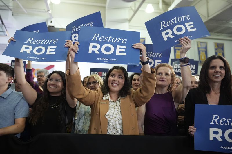 FILE - People listen as President Joe Biden speaks about reproductive freedom on April 23, 2024, at Hillsborough Community College in Tampa, Fla. (AP Photo/Manuel Balce Ceneta, file)