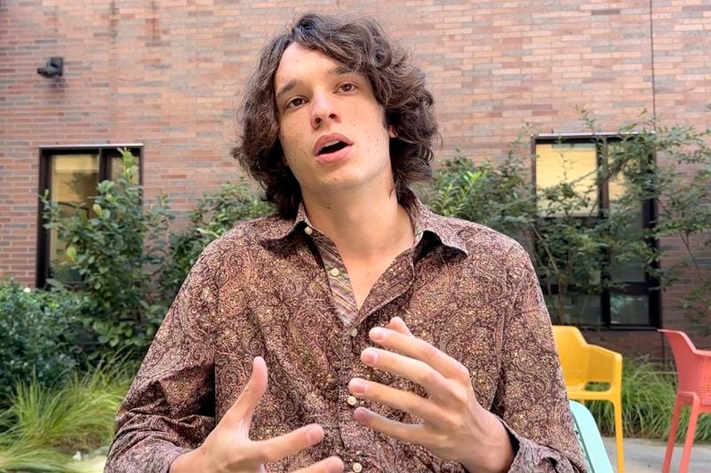 This image taken from video, Brown University student and member of the Brown Divest Coalition, Rafi Ash, speaks to a reporter from The Associated Press, Tuesday, Sept. 3, 2024, in Providence, R.I. (AP Photos/Michael Casey)