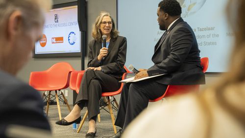 Her Excellency Birgitta Tazelaar, Ambassador of the Netherlands to the United States (left), speaks at the Black Business Breakfast at the Russell Center on Wednesday morning, Feb. 14, 2024. The event is part of the Dutch government's initiative to engage with the Black community in Atlanta through business, cultural exchange, and social justice following the Dutch government’s formal apology for their role in slavery in 2022. (Olivia Bowdoin for the AJC).