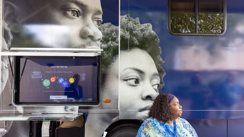 Erika Williams-Walker, Fulton County behavioral health program manager, stands in front of Fulton County’s new mental health mobile unit in Atlanta on Thursday, June 1, 2023. (Arvin Temkar / arvin.temkar@ajc.com)