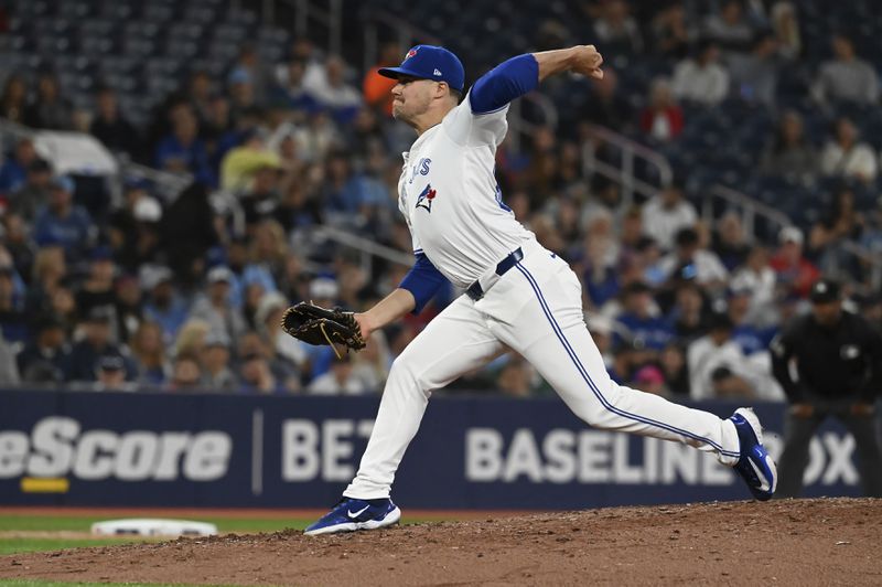 Toronto Blue Jays pitcher Brendon Little (54) throws to a Philadelphia Phillies batter in the sixth inning of a baseball game in Toronto on Tuesday Sept. 3, 2024. (Jon Blacker/The Canadian Press via AP)