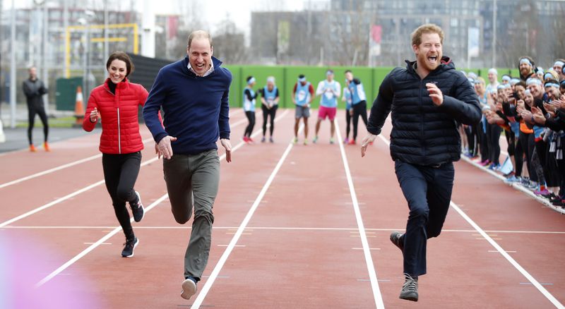 FILE - Britain's Prince William, second left, Kate, the Duchess of Cambridge, left, and Prince Harry take part in a relay race, during a training event to promote the charity Heads Together, at the Queen Elizabeth II Park in London, Sunday, Feb. 5, 2017. (AP Photo/Alastair Grant, Pool, File)