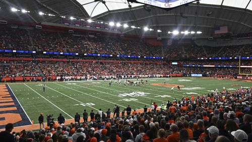 Fans watch Syracuse play Georgia Tech during the second half of an NCAA football game on Saturday, Sept. 7, 2024, in Syracuse, N.Y. Syracuse won 31-28. (AP Photo/Hans Pennink)