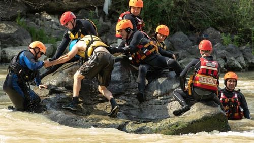 Using their vacation time to travel overseas to the country of Georgia this summer, Marietta Fire Department officials trained that country's Emergency Management Services in international swift water rescues. (Courtesy of Marietta)