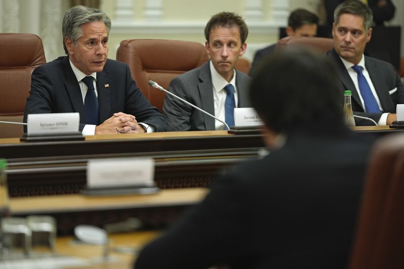 U.S. Secretary of State Antony Blinken meets with Ukraine's Prime Minister Denys Shmyhal at the Cabinet of Ministers in Kyiv, Ukraine, Wednesday, Sept. 11, 2024. (AP Photo/Mark Schiefelbein, Pool)