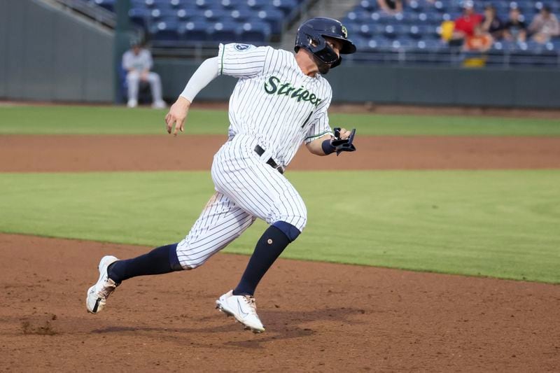 Gwinnett Stripers outfielder Forrest Wall (1) runs home as he scores a run during the fifth inning against the Jacksonville Jumbo Shrimp at Coolray Field, Tuesday, June 20, 2023, in Lawrenceville, Ga.  Jason Getz / Jason.Getz@ajc.com)