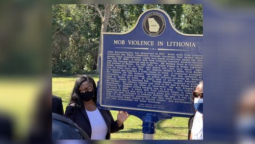 This is a plaque that was recently installed in a Lithonia park to honor Black lynching victims.