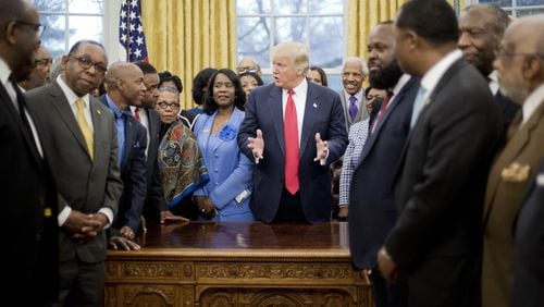Then-President Donald Trump meets with leaders of historically Black colleges and universities in the Oval Office of the White House in Washington, Monday, Feb. 27, 2017.  Walter Kimbrough, then president of Dillard University, was there, but said the event turned out to be a photo-op for Trump rather than a chance for HBCU leaders to share their concerns. (AP Photo/Pablo Martinez Monsivais)