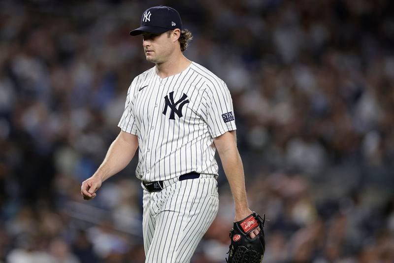 New York Yankees pitcher Gerrit Cole walks off the mound during the sixth inning of Game 1 of the American League baseball division series against the Kansas City Royals, Saturday, Oct. 5, 2024, in New York. (AP Photo/Adam Hunger)