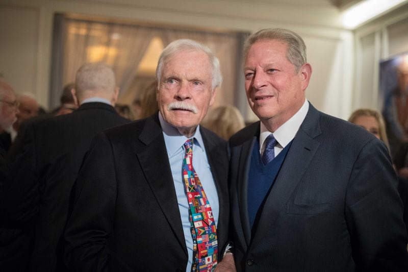 Ted Turner poses for a photo with former Vice President Al Gore during Turner's 80th birthday party at the St. Regis Atlanta hotel on Saturday, Nov. 17, 2018, in Atlanta.  Turner, who recently announced he has Lewy body dementia, turns 80 on Monday. (Photo: BRANDEN CAMP/SPECIAL TO THE AJC)