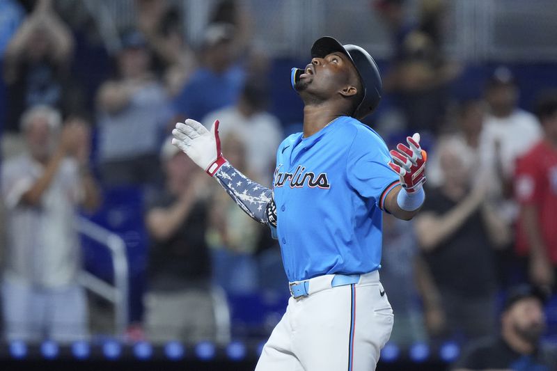 Miami Marlins' Jesús Sánchez celebrates after hitting a home run during the sixth inning of a baseball game against the Atlanta Braves, Sunday, Sept. 22, 2024, in Miami. (AP Photo/Wilfredo Lee)