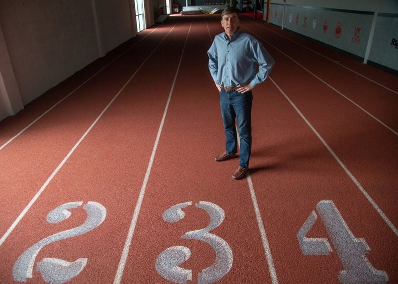Atlanta track club’s Executive Director Rich Kenah near their indoor track at the track club’s office in Atlanta June 4, 2019. STEVE SCHAEFER / SPECIAL TO THE AJC