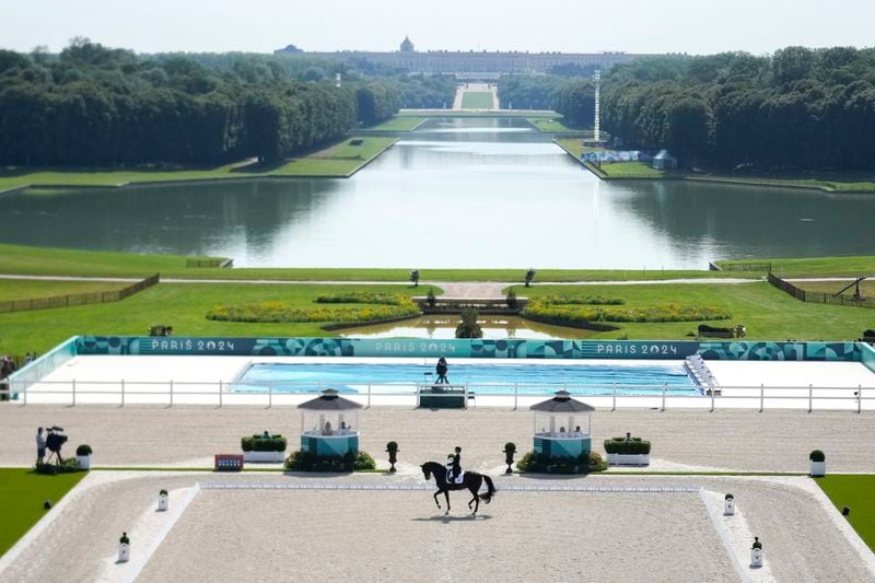 Canada's Naïma Moreira-Laliberté, riding Statesman, during the Equestrian Dressage competition, at the 2024 Summer Olympics, Tuesday, July 30, 2024, in Versailles, France. (AP Photo/Mosa'ab Elshamy)