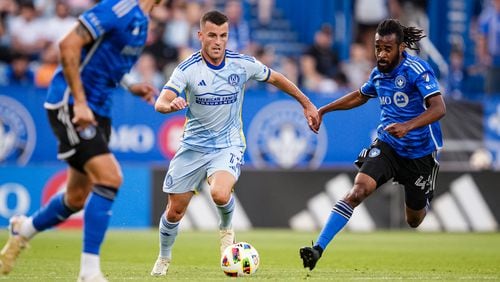 Atlanta United defender Brooks Lennon #11 dribbles the ball during the match against the CF Montreal at Stade Saputo in Montreal, Canada on Saturday July 13, 2024. (Photo by Mitch Martin/Atlanta United)