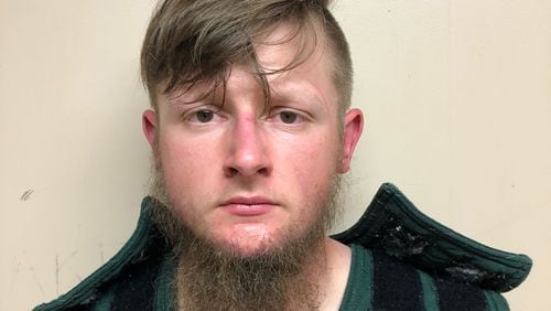 In this handout provided by the Crisp County Sheriff's Office, Robert Aaron Long is pictured in a jail booking photo on March 16, 2021, in Cordele, Georgia. Long, 21, was arrested as the suspect in a series of shootings at three Atlanta-area spas. (Crisp County Sheriff's Office/Getty Images/TNS)