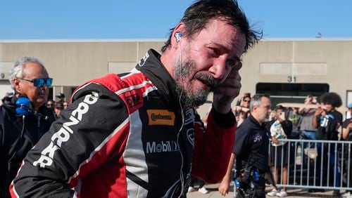 Keanu Reeves drives during the GR Cup Series auto race at Indianapolis Motor Speedway, Saturday, Oct. 5, 2024, in Indianapolis. (AP Photo/Darron Cummings)