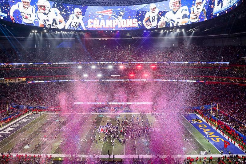 Confetti falls along the field at Mercedes-Benz Stadium after the the New England Patriots defeated the Los Angeles Rams, 13-3, in Super Bowl LIII on Sunday, Feb. 3, 2019.  (ALYSSA POINTER/ALYSSA.POINTER@AJC.COM)