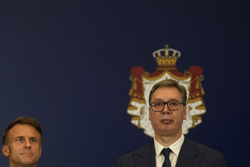 French President Emmanuel Macron, left, and Serbian President Aleksandar Vucic stand during the signing of bilateral documents in Belgrade, Serbia, Thursday, Aug. 29, 2024. French President Emmanuel Macron starts a two-day state visit to Serbia with the focus on a possible sale of 12 Rafale multi-purpose fighter jets to a country that has maintained close ties to Russia despite its aggression on Ukraine. (AP Photo/Darko Vojinovic)