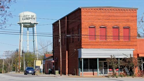 Many of the stores in downtown Lumpkin are closed or vacant. Stewart County in south Georgia was singled out in a recent U.S. Census Bureau report as having one of the lowest median household incomes in the nation at $20,882. A small rural county with about 5,700 residents, Stewart also has one the highest percentages of families living in poverty at 38.4 percent. All of the county's 515 students receive free breakfasts and lunches. Free dinners will be next, if the county gets approved for federal grants. BOB ANDRES /BANDRES@AJC.COM
