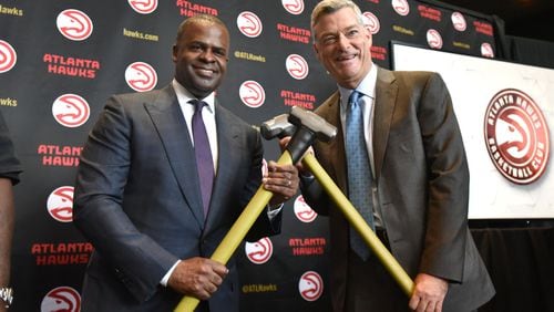 June 28, 2017 Atlanta - Mayor Kasim Reed (left) and Hawks principal owner Tony Ressler hold sledge hammers as they pose for members of the press during a press to release details of the $192.5 million update of Philips Arena on Wednesday, June 28, 2017. HYOSUB SHIN / HSHIN@AJC.COM