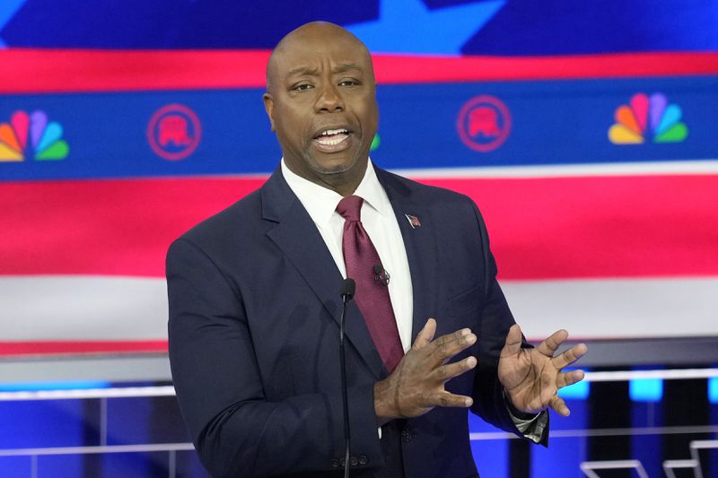 FILE - Sen. Tim Scott, R-S.C., speaks during a Republican presidential primary debate, Nov. 8, 2023, in Miami. Former President Donald Trump has narrowed his vice presidential shortlist to a handful of contenders that include Scott, as he prepares to announce his pick in the days before, or perhaps at, next month's Republican National Convention. Trump told reporters Saturday, June 22, that he already has made his decision and that that person will be in attendance Thursday night in Atlanta at the first debate of the general election campaign with Democratic President Joe Biden. (AP Photo/Rebecca Blackwell, File)