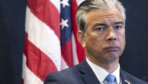 FILE - California Attorney General Rob Bonta takes questions from the media as he announces charges made against suspects involved in an organized retail crime ring during a news conference in Los Angeles Tuesday, March 19, 2024. (AP Photo/Damian Dovarganes, File)