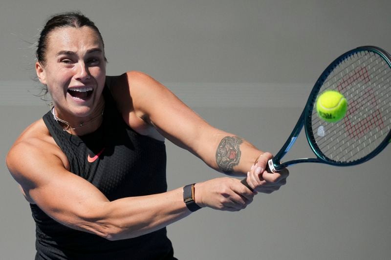 Aryna Sabalenka of Belarus returns a shot from Madison Keys of the United States during their women's singles match of the China Open tennis tournament, at the National Tennis Center in Beijing, Wednesday, Oct. 2, 2024. (AP Photo/Achmad Ibrahim)