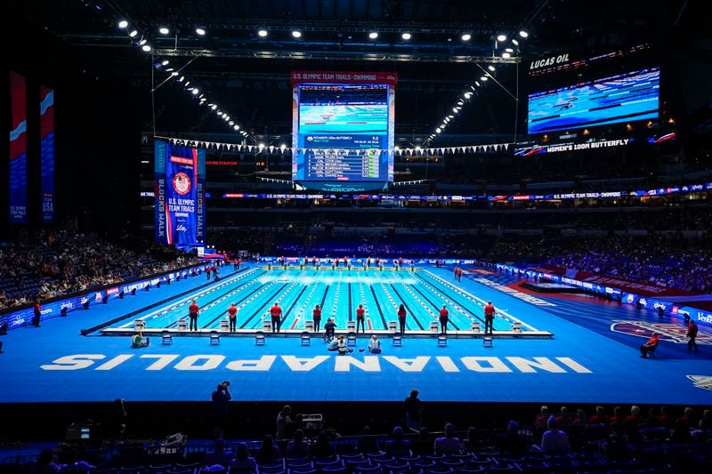 Swimmer participate in the Women's 100 Butterfly Saturday, June 15, 2024, at the US Swimming Olympic Trials in Lucas Oil Stadium in Indianapoils. (AP Photo/Darron Cummings)