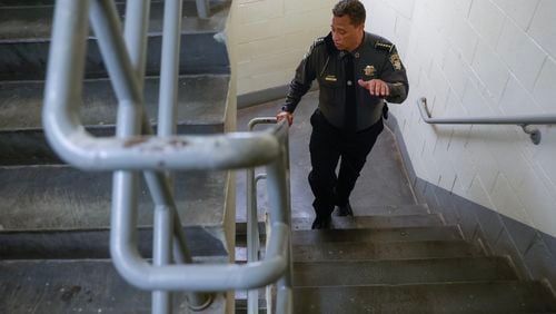 Fulton County Sheriff Patrick Labat walks up stairs in a corridor of Fulton County Jail on Thursday, March 30, 2023. Plans for a new multibillion dollar facility on the 35 acre campus are underway. (Natrice Miller/ natrice.miller@ajc.com)