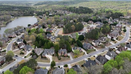 Aerial photograph shows the Hamilton Mill subdivision, a 2,200 home community nestled in the hills of Northeast Gwinnett County, Tuesday, April 2, 2024, in Dacula. (Hyosub Shin / Hyosub.Shin@ajc.com)