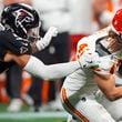 Atlanta Falcons linebacker Kaden Elliss (55) tackles Kansas City Chiefs running back Carson Steele (42) during the first half of an NFL football game, Sunday, Sept. 22, 2024, in Atlanta. (AP Photo/Brynn Anderson)