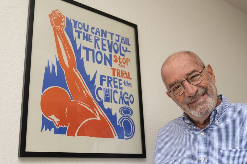 Lee Weiner poses for a photo in his apartment Monday, Aug. 12, 2024, in Dunedin, Fla. (AP Photo/Chris O'Meara)