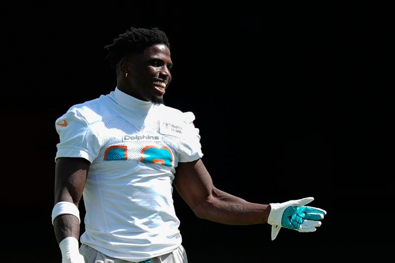 Miami Dolphins wide receiver Tyreek Hill walks on the field during a team practice session, Wednesday, Sept. 11, 2024, in Miami Gardens, Fla.(AP Photo/Rebecca Blackwell)