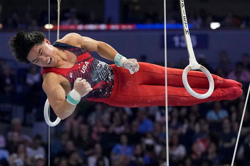 Asher Hong competes on the still rings at the United States Gymnastics Olympic Trials on Saturday, June 29, 2024, in Minneapolis. (AP Photo/Charlie Riedel)
