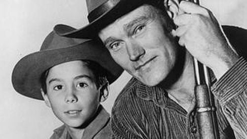 Johnny Crawford and Chuck Connors in "The Rifleman." Crawford, known for playing the young son of Connors on the ABC series “The Rifleman” from 1958 to ’63, has died. The actor was 75.